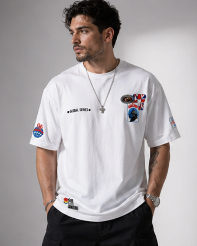 Oversized White Graphic T-Shirt with Premium Badge Detail.