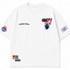 Oversized White Graphic T-Shirt with Premium Badge Detail.