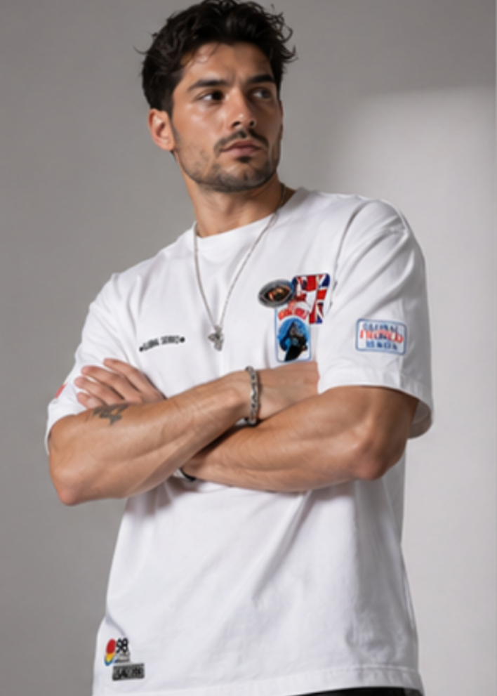 Oversized White Graphic T-Shirt with Premium Badge Detail.